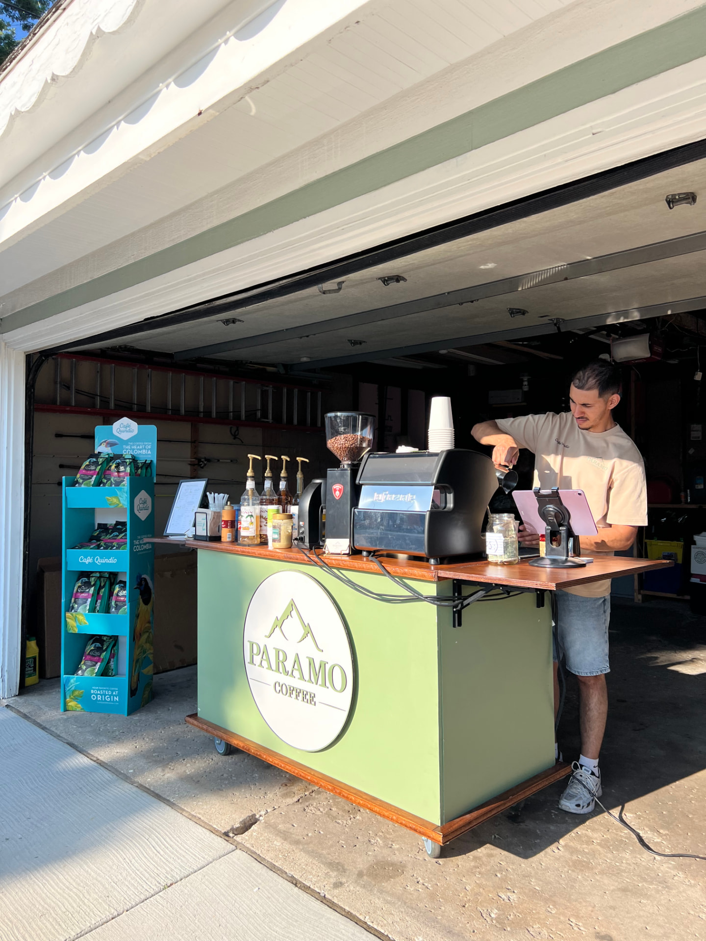 Barista pulling espresso on the Paramo Coffee cart